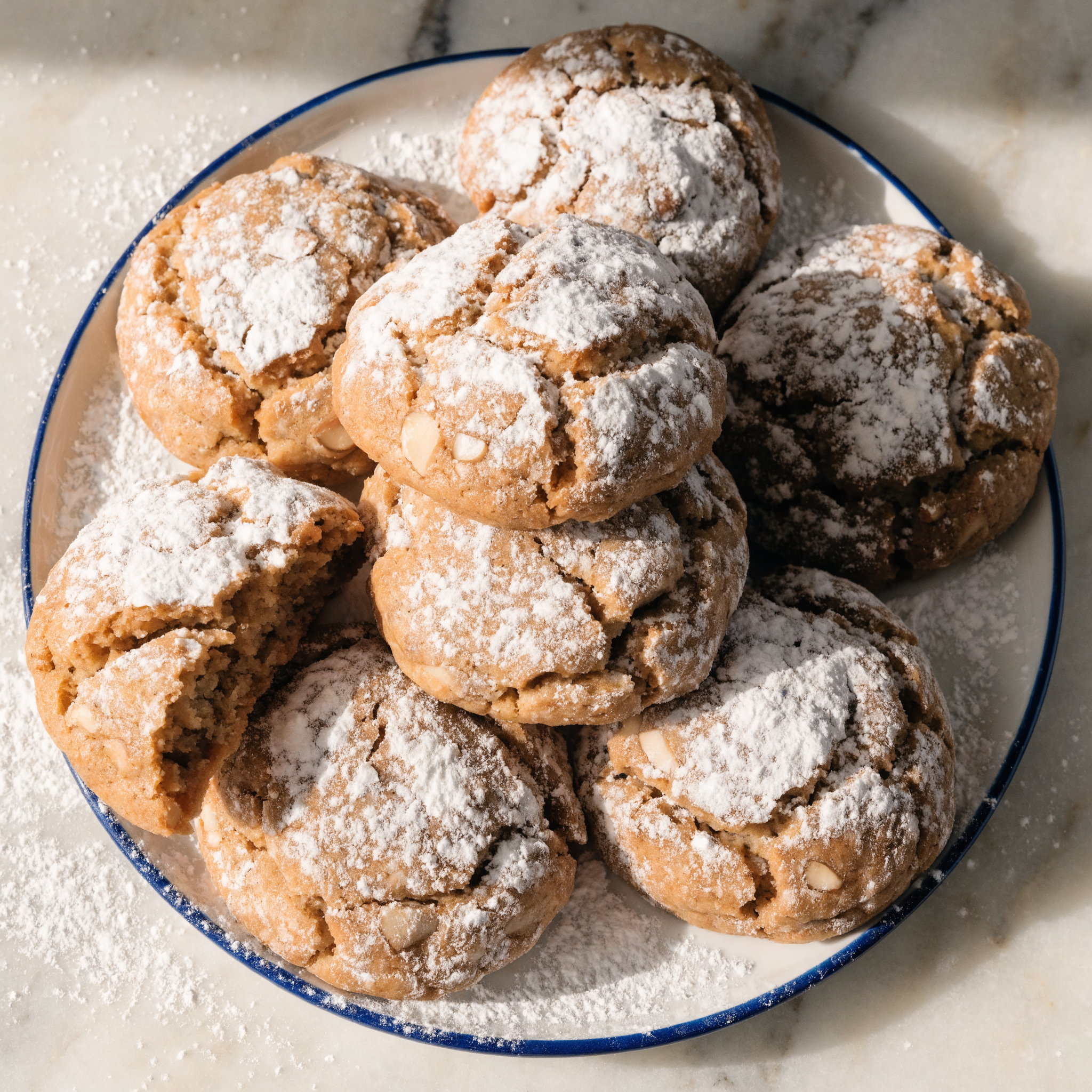 Almond coconut cookies on a ceramic plate